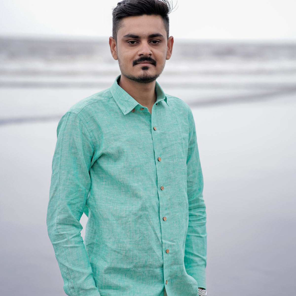 mint green shirt